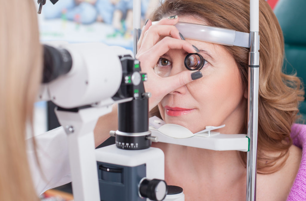 Woman recieving eye exam