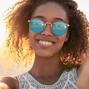 Trendy Woman Happy With New Sunglasses