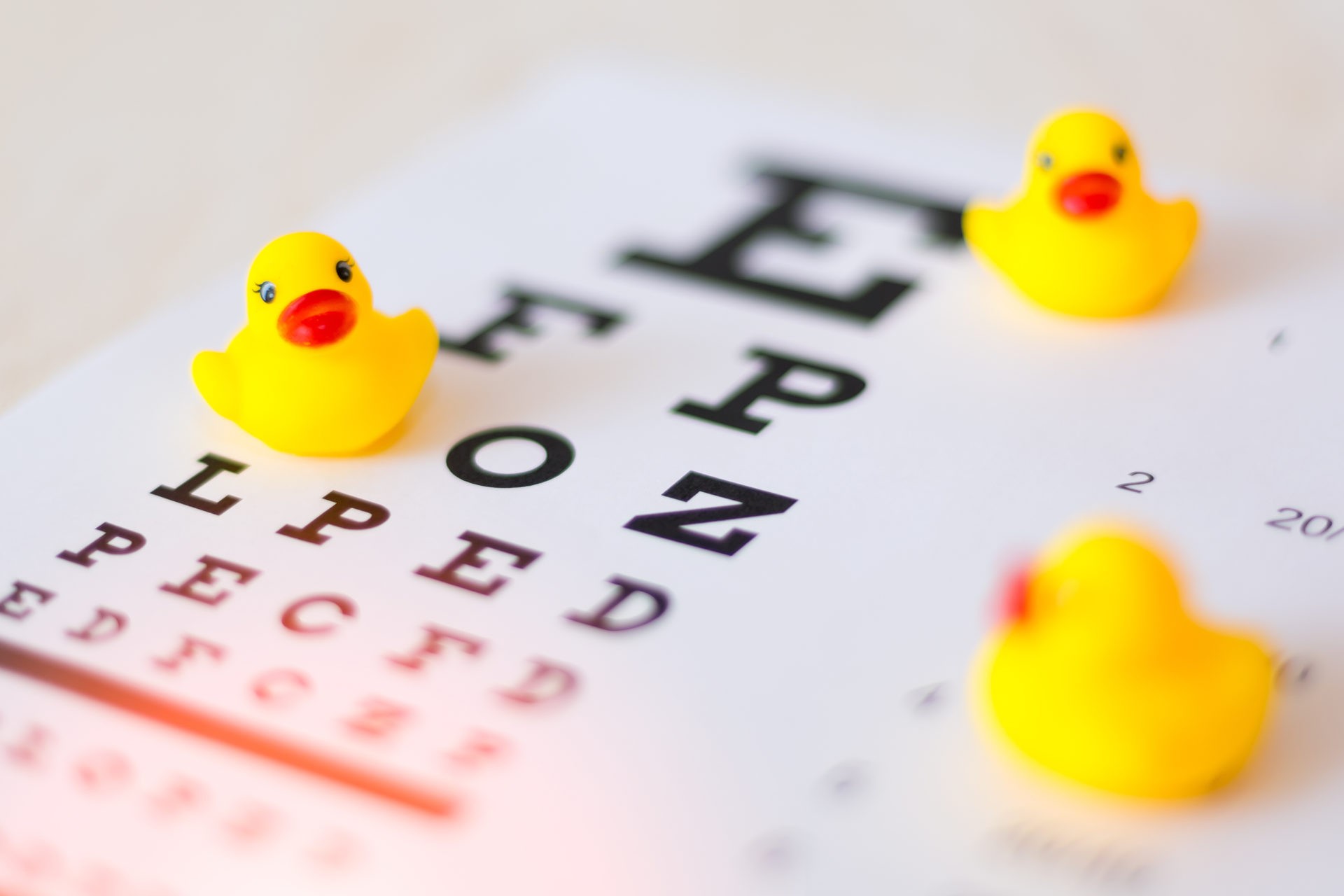 Pediatric eye exam sheet with yellow rubber duck