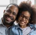 Father and daughter happy with glasses