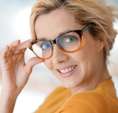 Trendy woman happy with new glasses