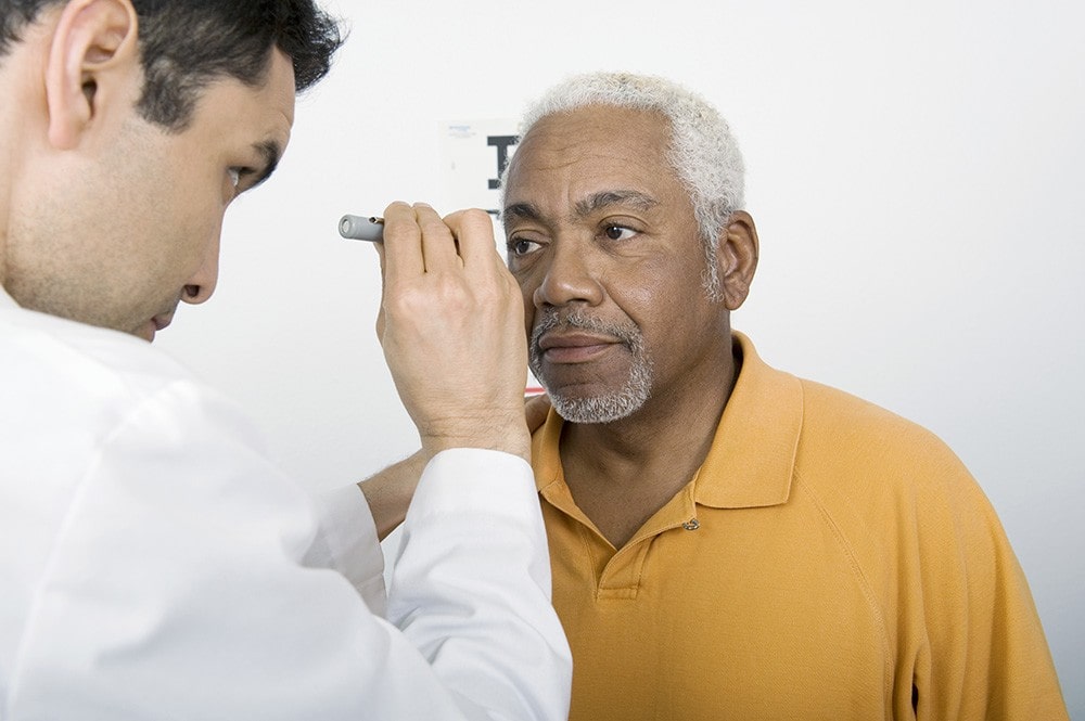 OPMT Optometrist Giving Patient Glaucoma Eye Test