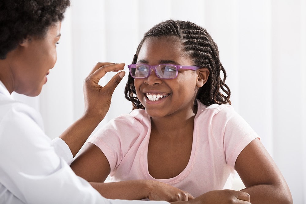Young girl Receiving Eyecare From OPMT Optometrist