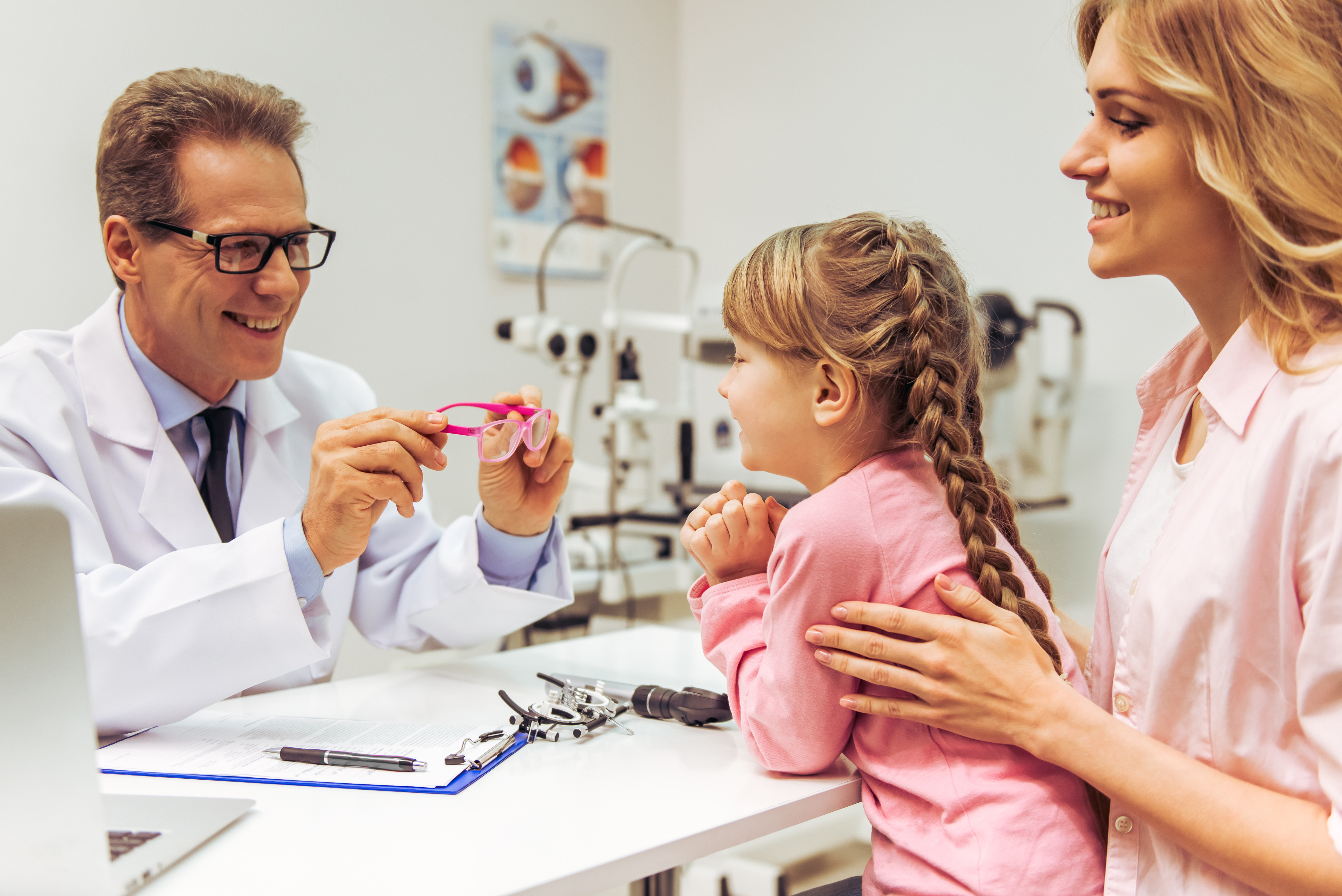 Nice,Little,Girl,And,Her,Mother,At,The,Ophthalmologist,On Pediatric eye appointment at OPMT Vision Centers