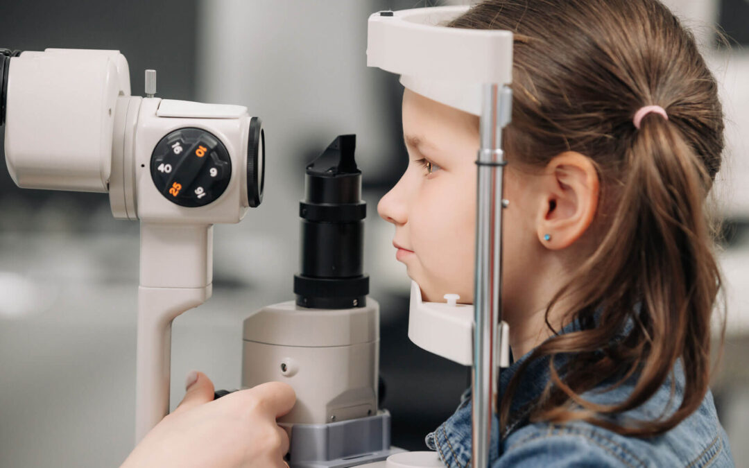 Child getting an myopia eye exam in Nashville at OPMT