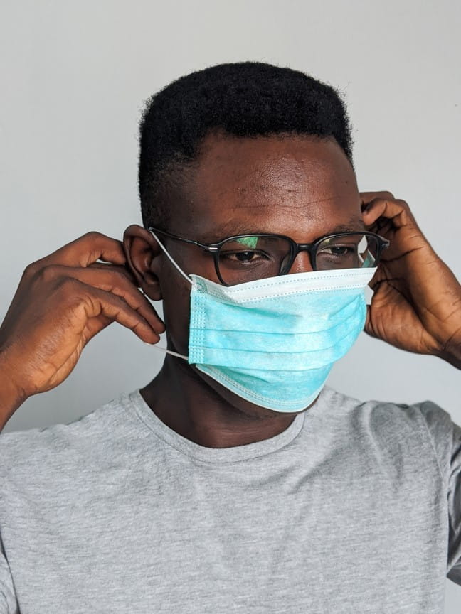 Man wearing eyeglasses and mask at OPMT